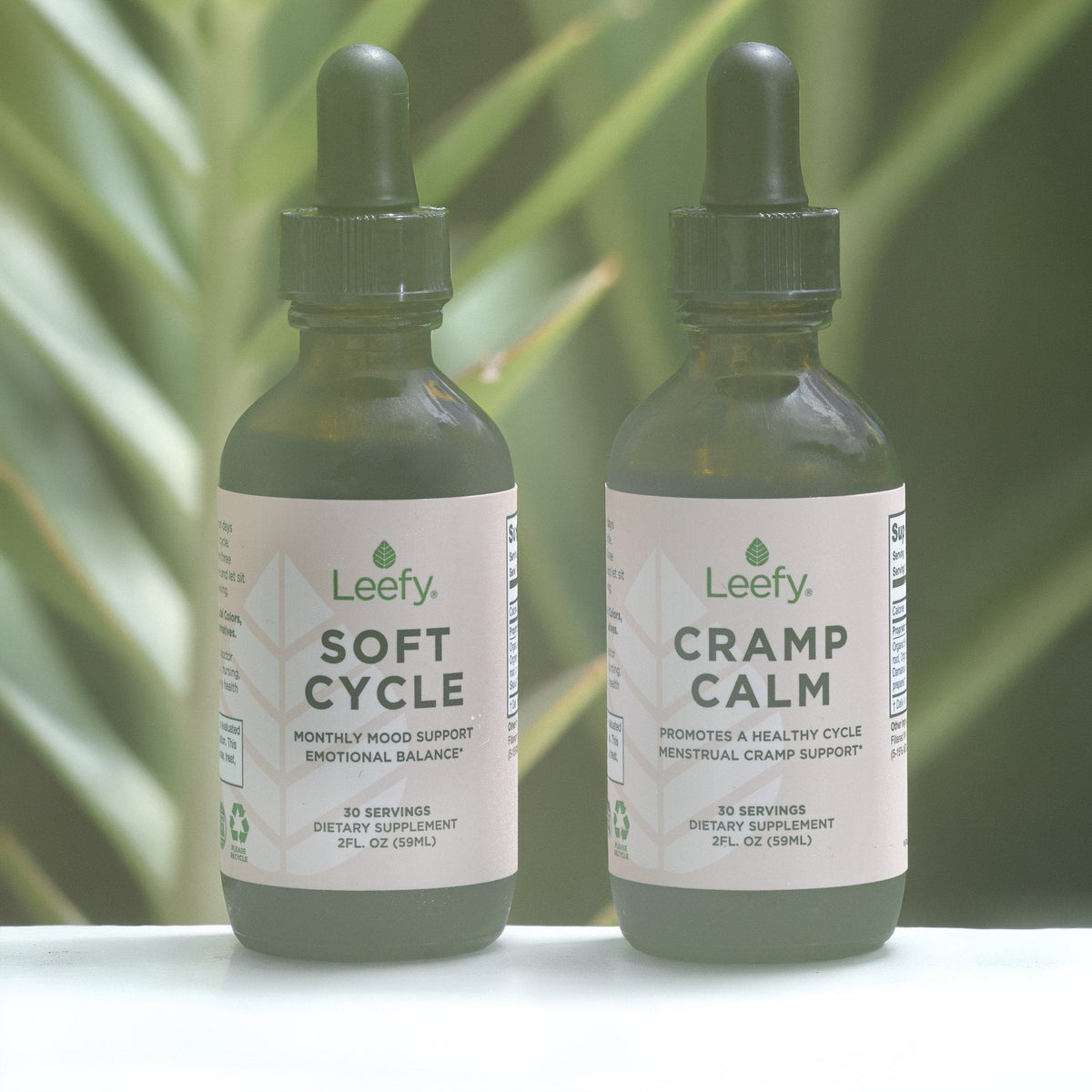 Cycle Support Bundle: Cramp Calm and Soft Cycle among green leaves